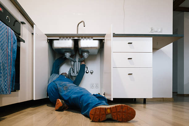 Professional Emergency Plumber technician working in Mapleton, IA